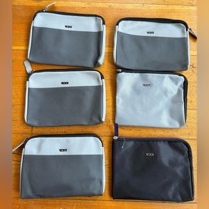 (6) TUMI Small Travel Kits.